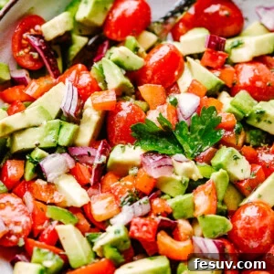A vibrant bowl of homemade avocado salsa, ready to be enjoyed.
