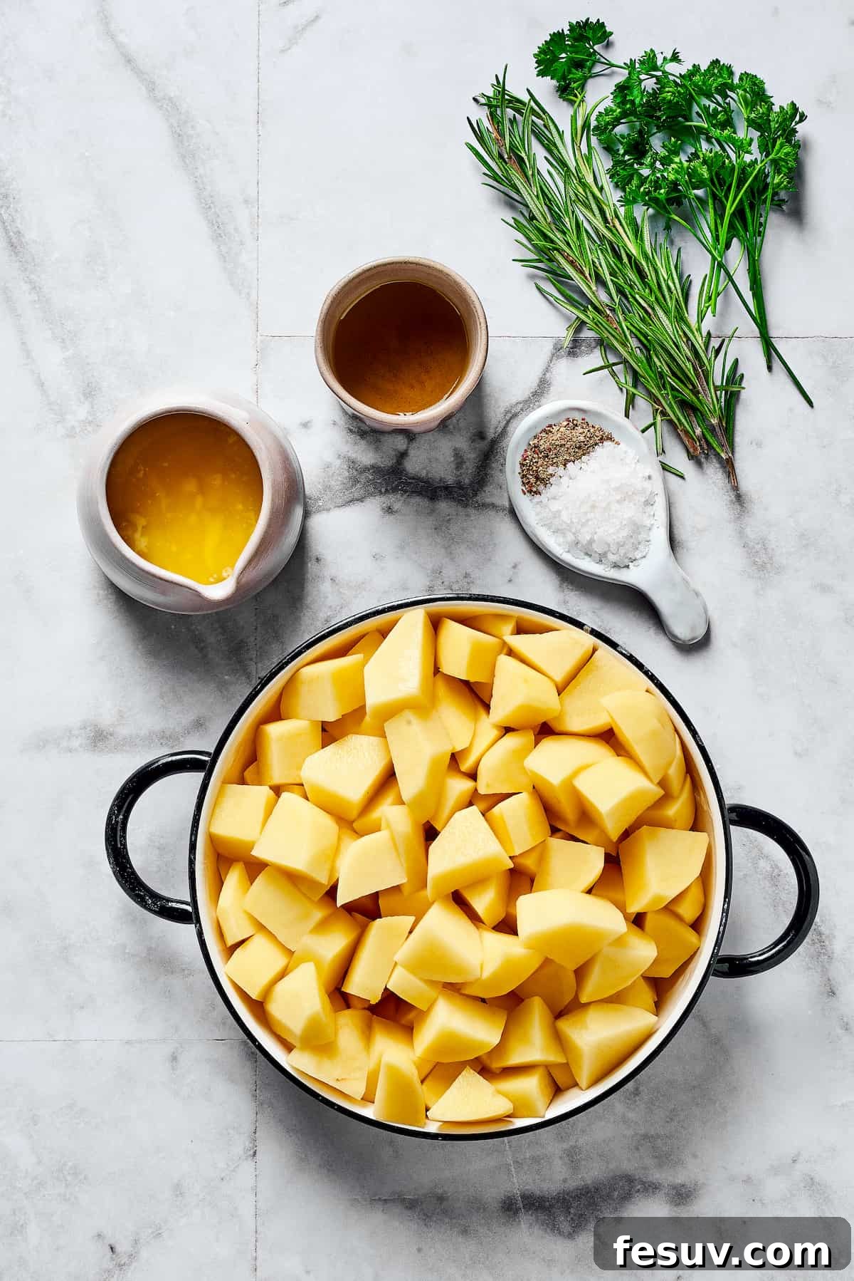 ed Potatoes are crisp, buttery, and easy to make. With a simple seasoning of salt, pepper, and rosemary, they're irresistible! From top: Oil, fresh rosemary, fresh parsley, melted butter, salt and pepper, cut-up raw potatoes.