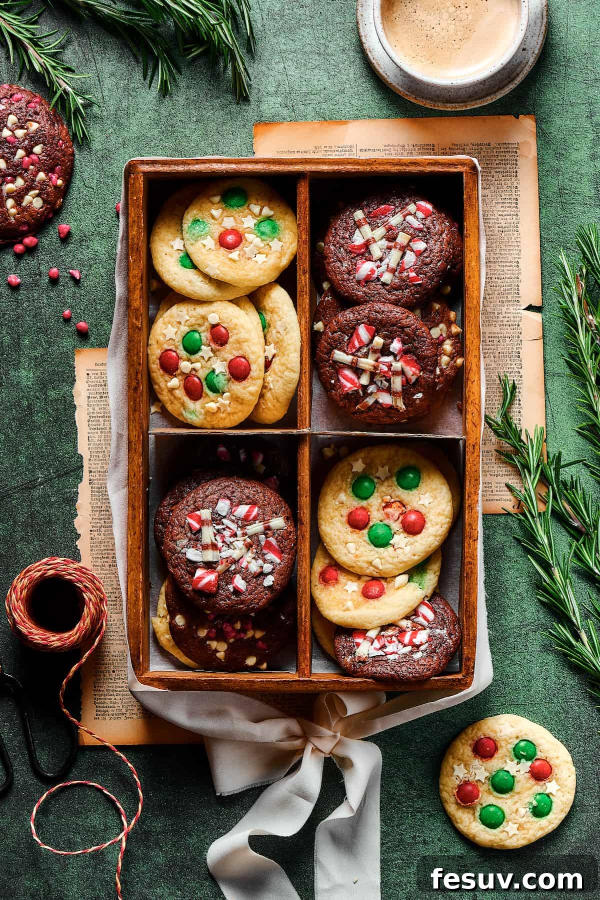 A charming divided box filled with a variety of festive Christmas cookies, each section showcasing different holiday treats.