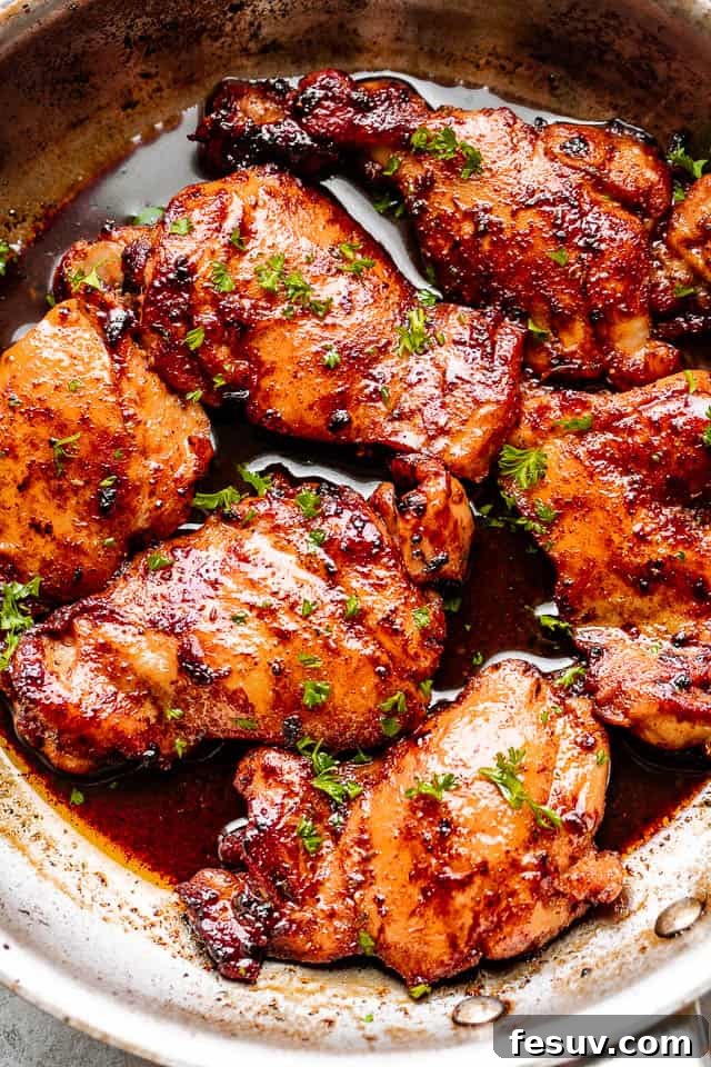 Moist, juicy & tender Cajun chicken thighs are flavorful, rich, and cooked in a spicy Cajun rub and topped with velvety butter sauce. Cooking chicken thighs in a skillet, coated in a spicy Cajun rub and drizzled with butter sauce.