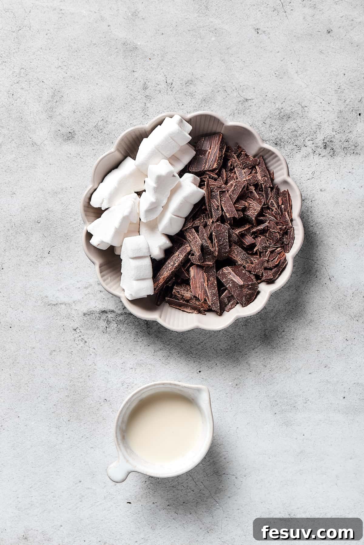 Chocolate Rice Krispie Treats are light and crunchy, with a sticky marshmallow texture and real dark chocolate. Easy and scrumptious! Dark chocolate, marshmallows, and heavy cream.