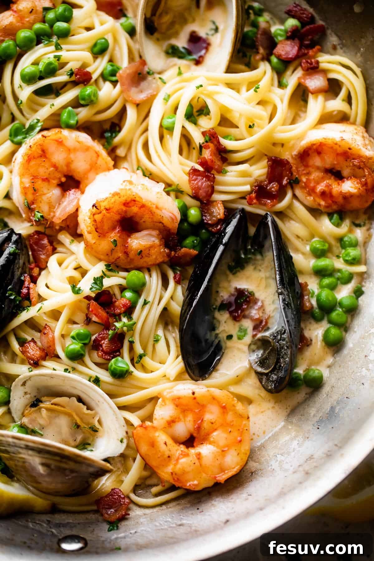 Velvet Seafood Pasta 2 linguine, shrimp, mussels, bacon bits, and green peas tossed in a rich and creamy sauce.