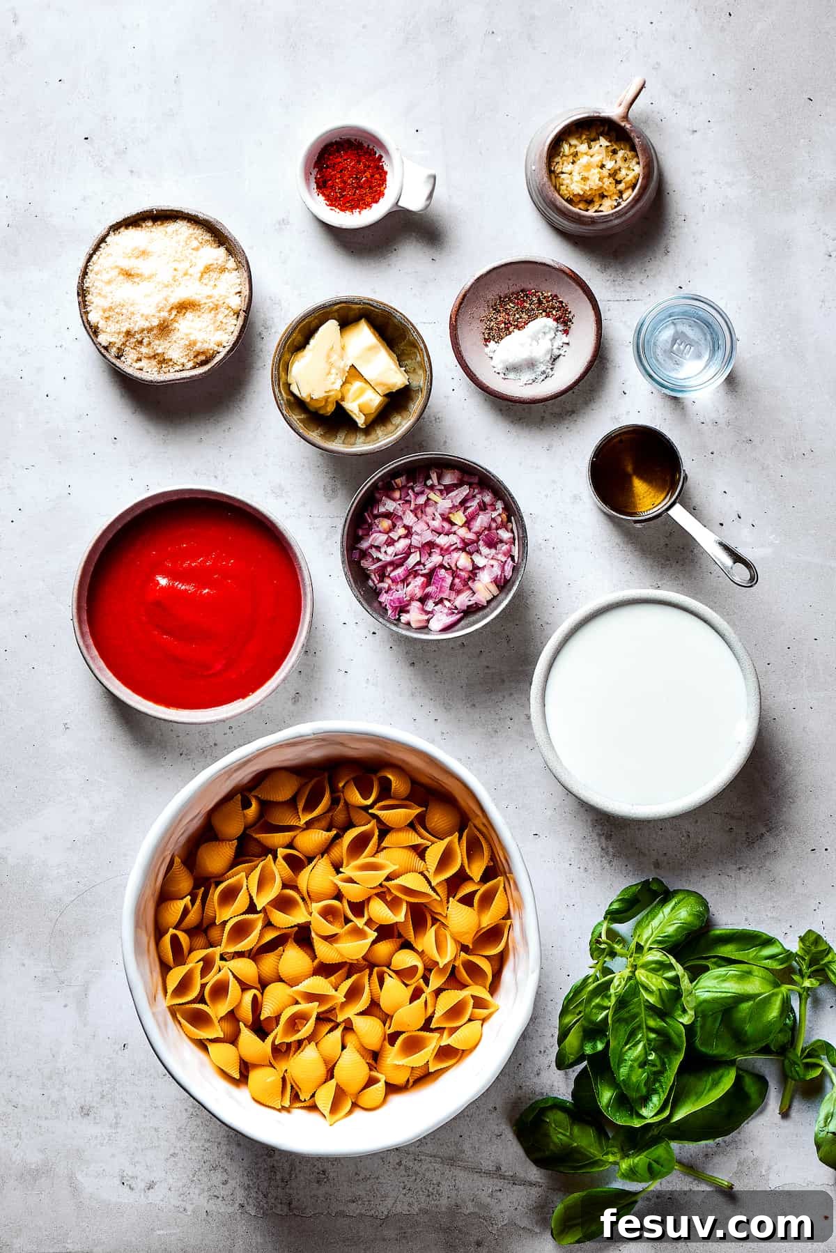 Gigi Hadid pasta ingredients meticulously measured and artfully arranged on a kitchen work surface.