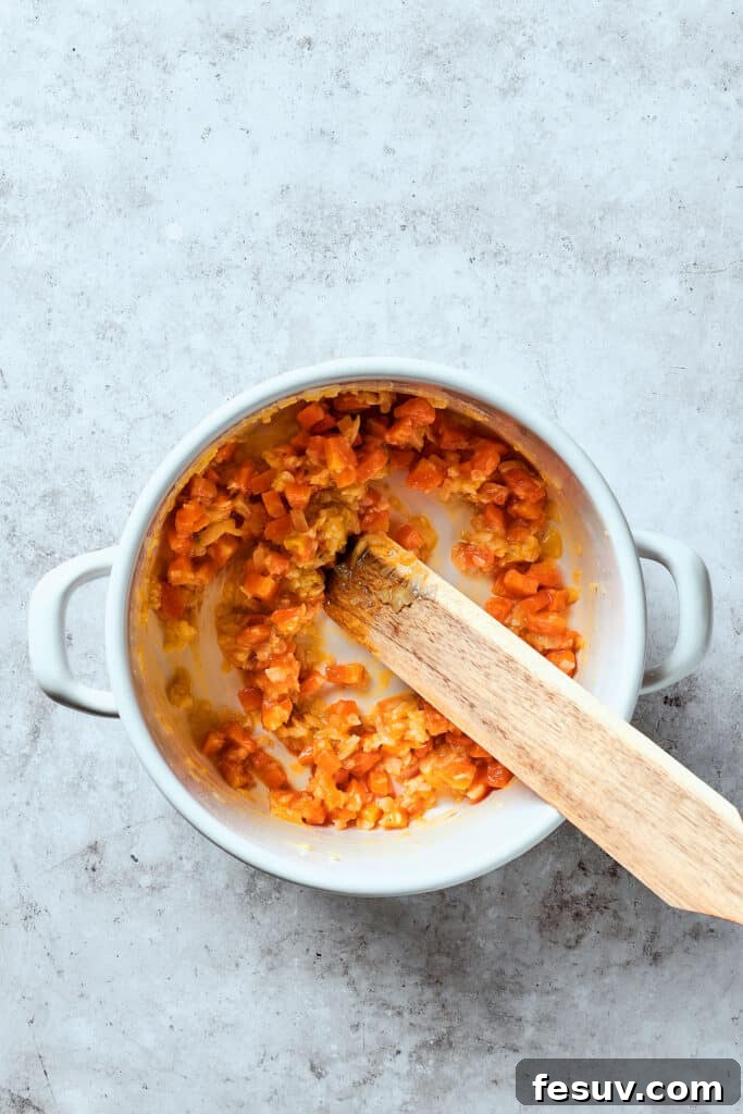 This Creamy Reuben Soup takes corned beef, sauerkraut, and Swiss to a whole new level! It's a comfy, cozy masterpiece in a bowl. Vegetables cooked with flour and butter.
