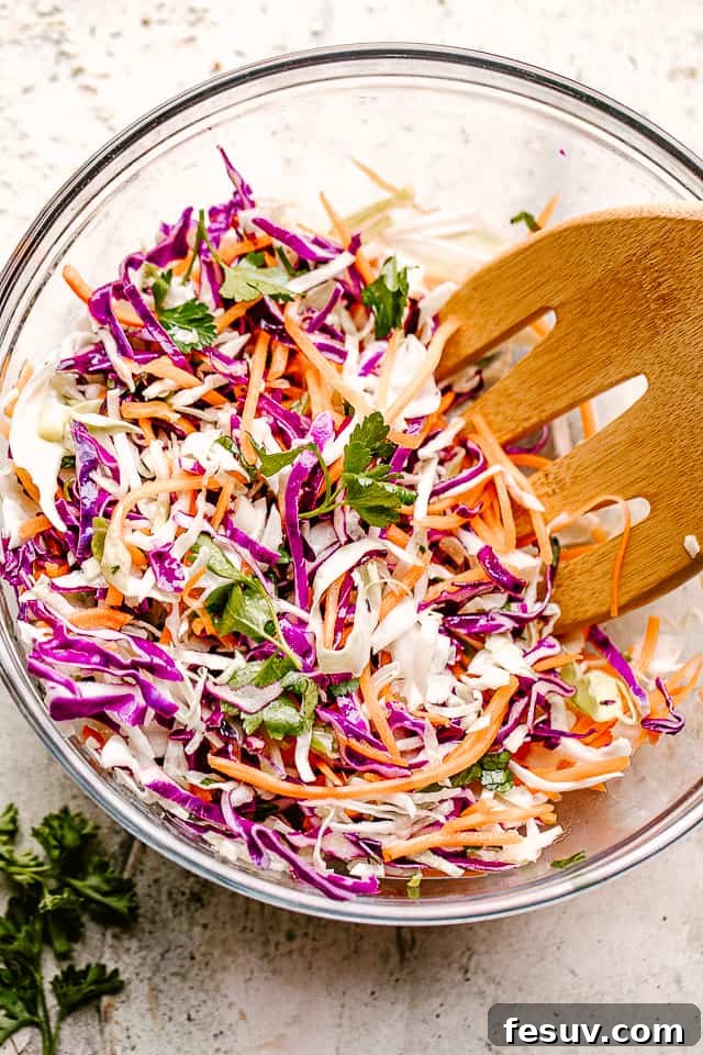 Zesty Asian Cabbage Crunch 4 Asian cabbage slaw in a glass mixing bowl.