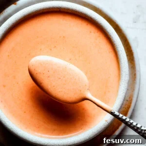 Homemade yum yum sauce in an earthenware bowl.