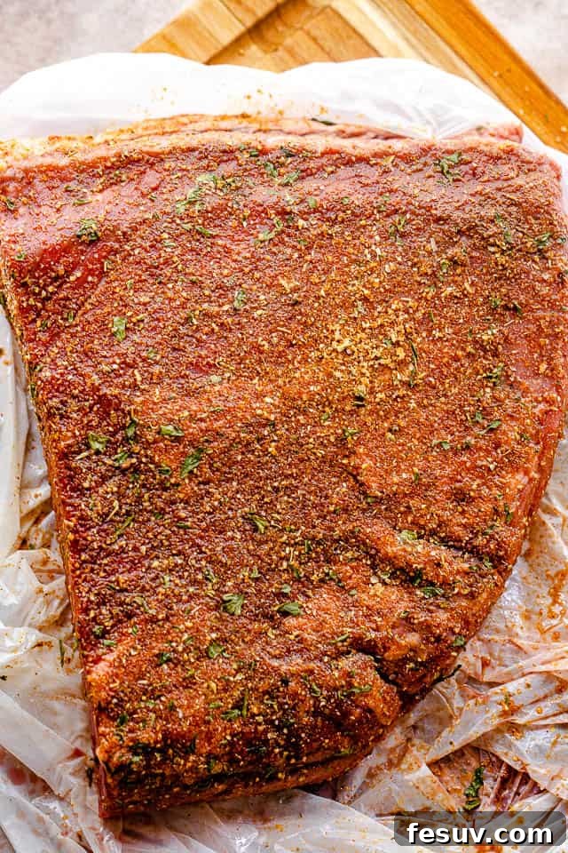 top shot of seasoned raw beef brisket