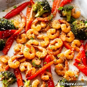 Teriyaki Shrimp Sheet Pan Dinner 2 Overhead shot of Sheet Pan Teriyaki Shrimp Stir Fry, showing a complete meal.