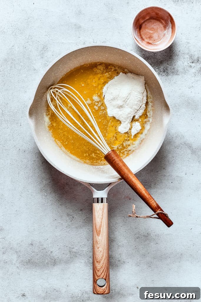 Making a roux in a skillet.