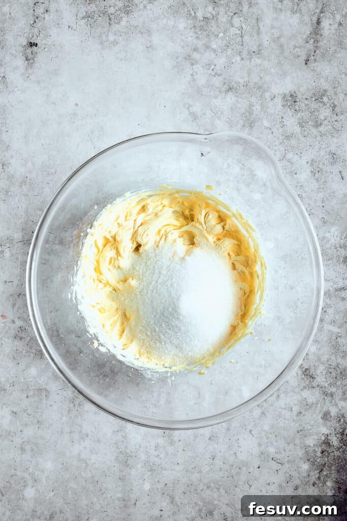 Creaming butter and sugar is key for fluffy cupcakes. Creaming butter and sugar together in a mixing bowl until light and fluffy.