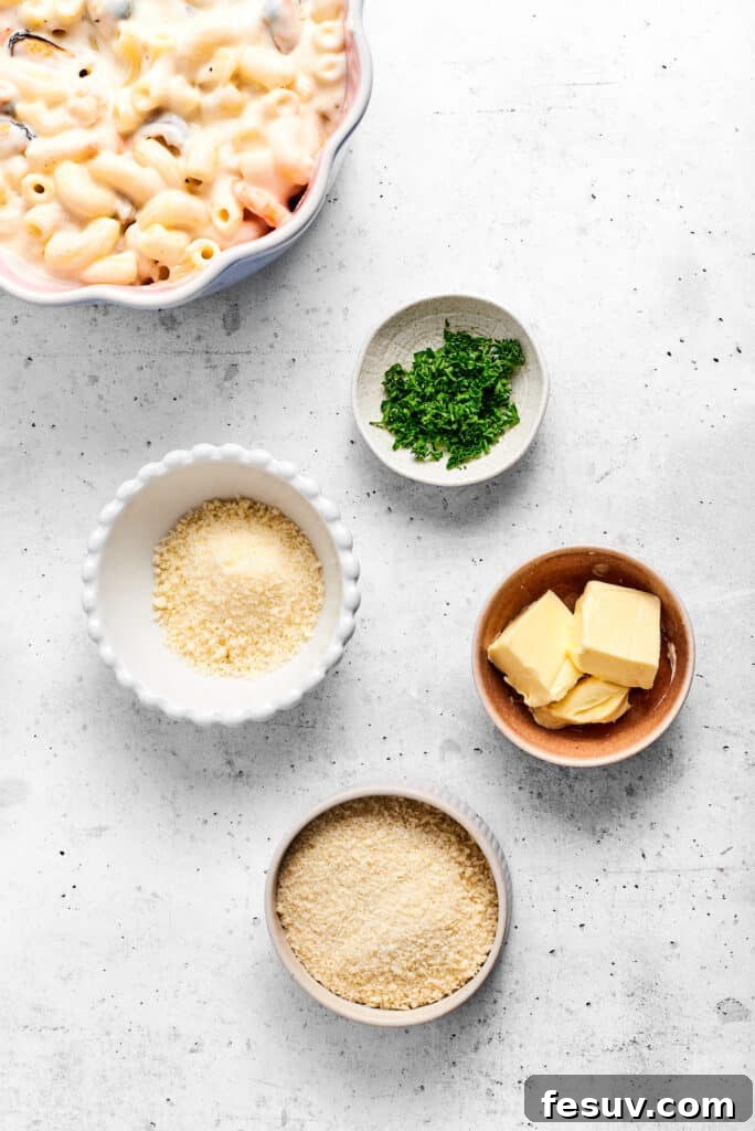 A bowl of parmesan breadcrumb mixture, ready to top the seafood mac and cheese.