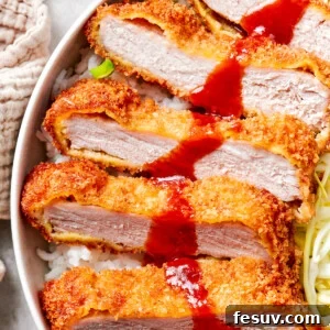A close up of sliced pork katsu.