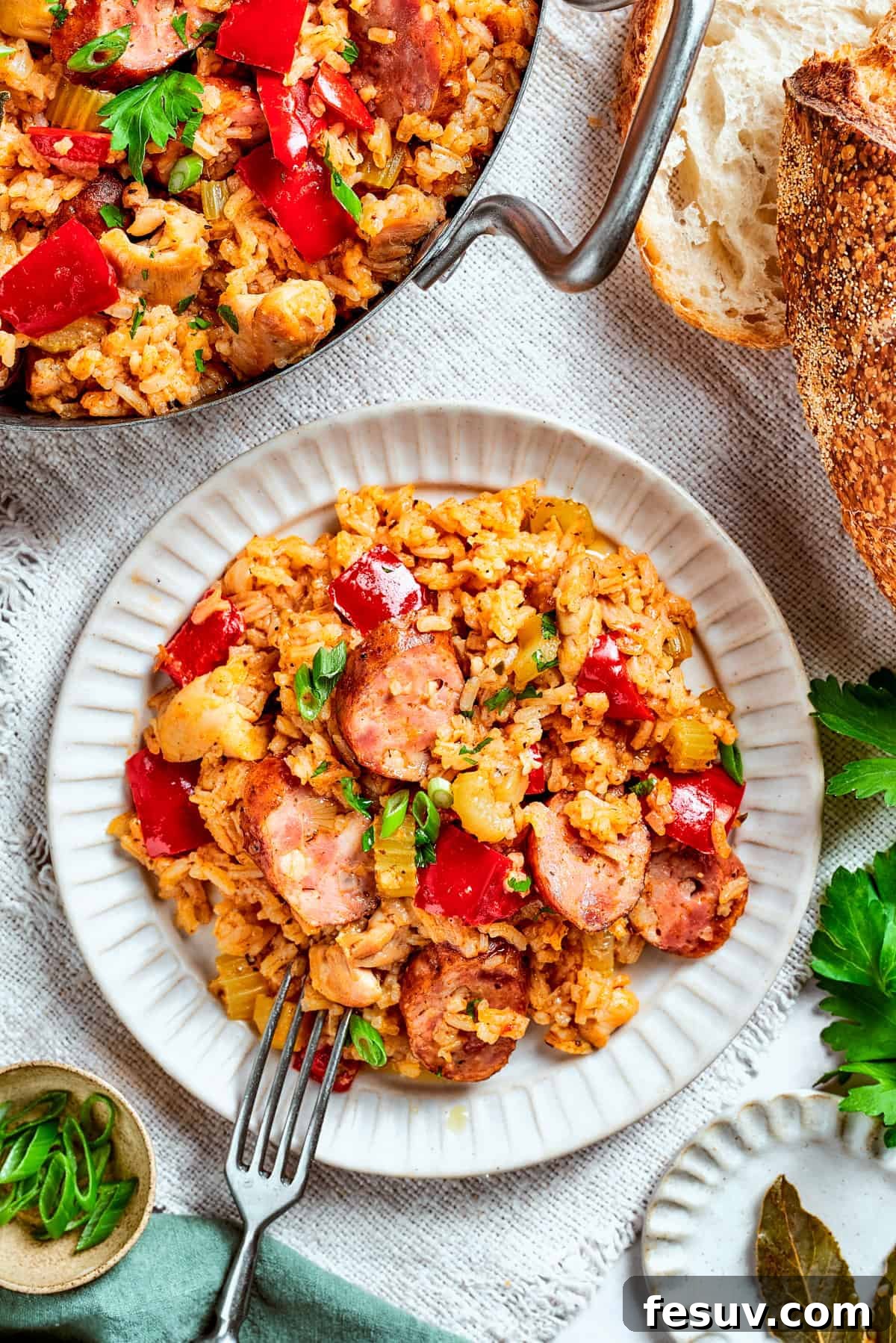 Jambalaya served on a dinner plate.