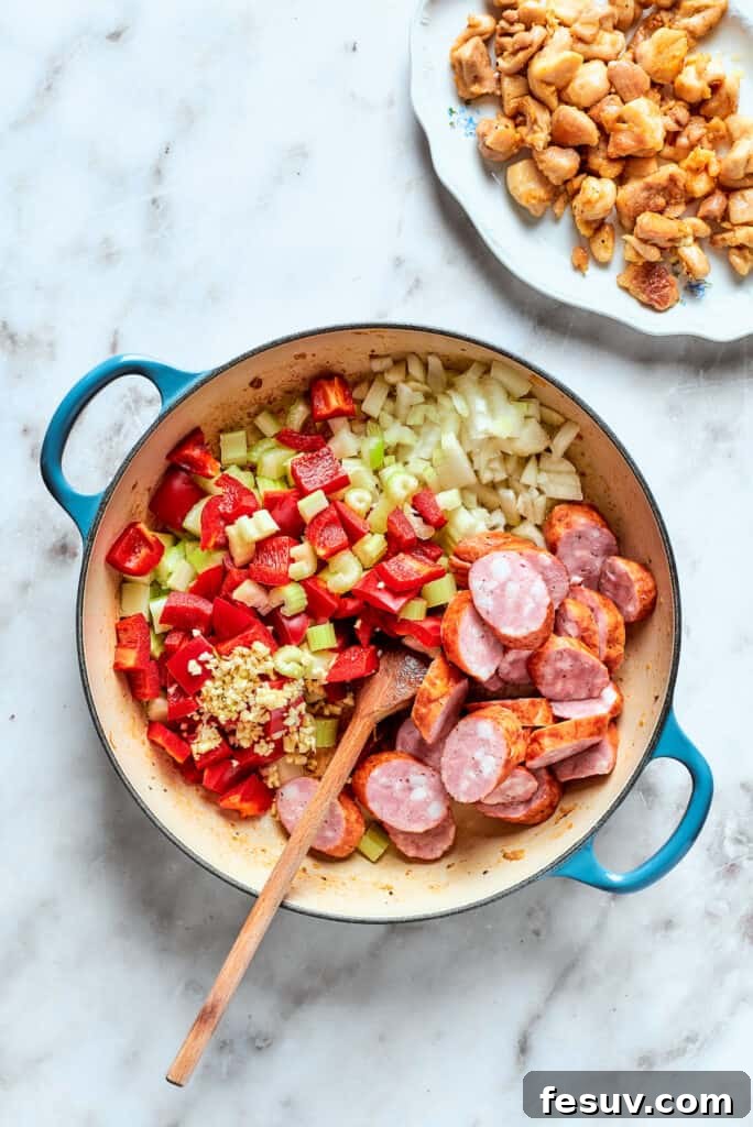 The rest of the jambalaya ingredients are added in.