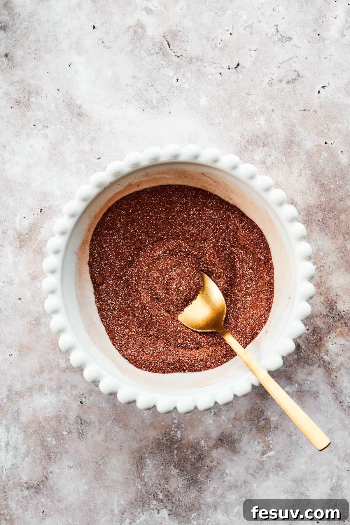 Heavenly Chocolate Pudding Cake 11 A spoon mixes the fudge topping.