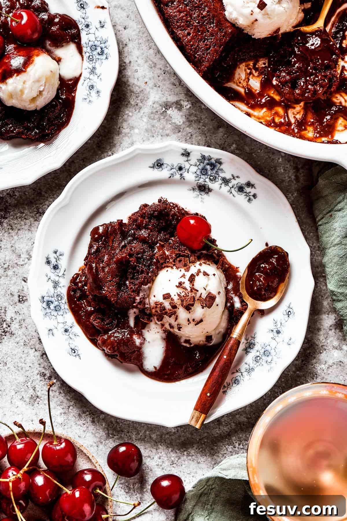 Heavenly Chocolate Pudding Cake 3 Pudding cake served on a dessert plate with a scoop of ice cream.