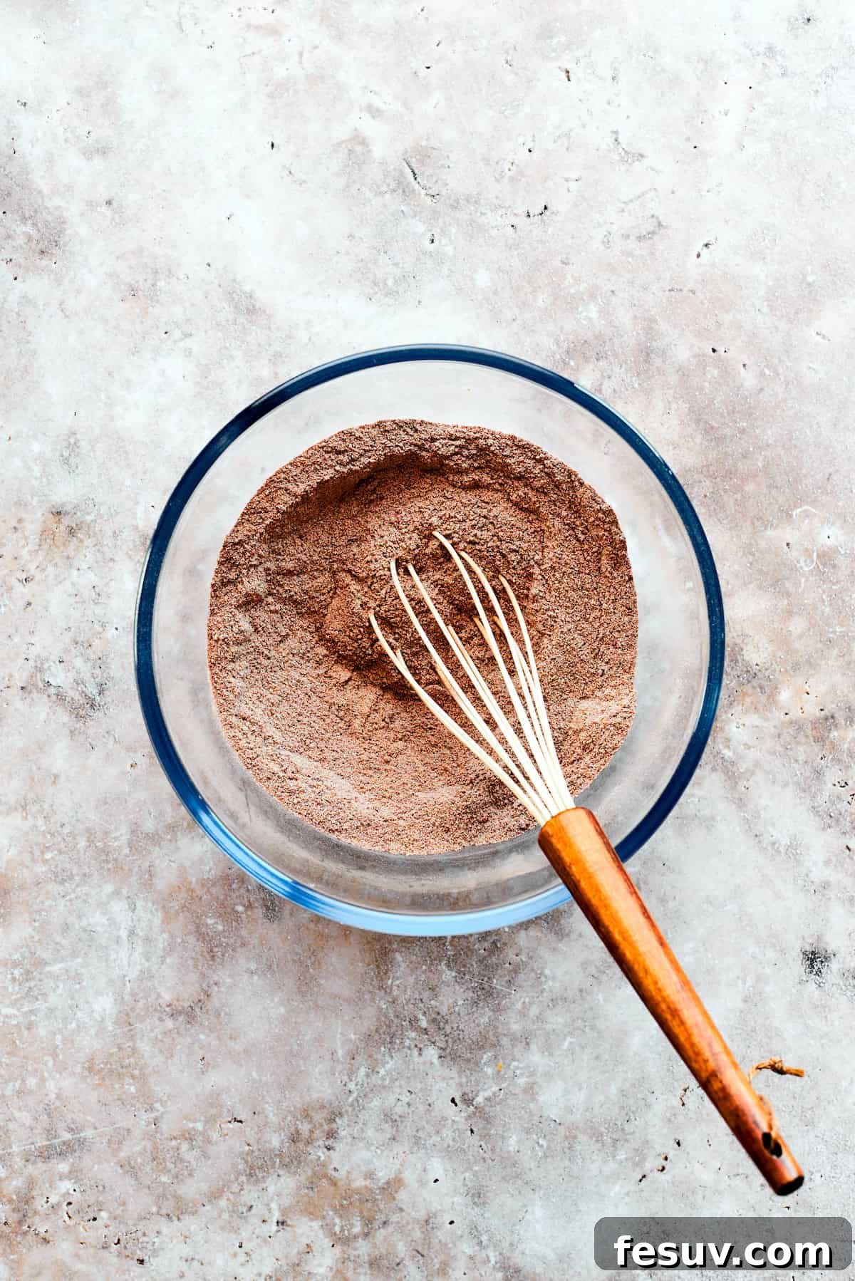 Heavenly Chocolate Pudding Cake 7 Dry ingredients for chocolate pudding cake are whisked.