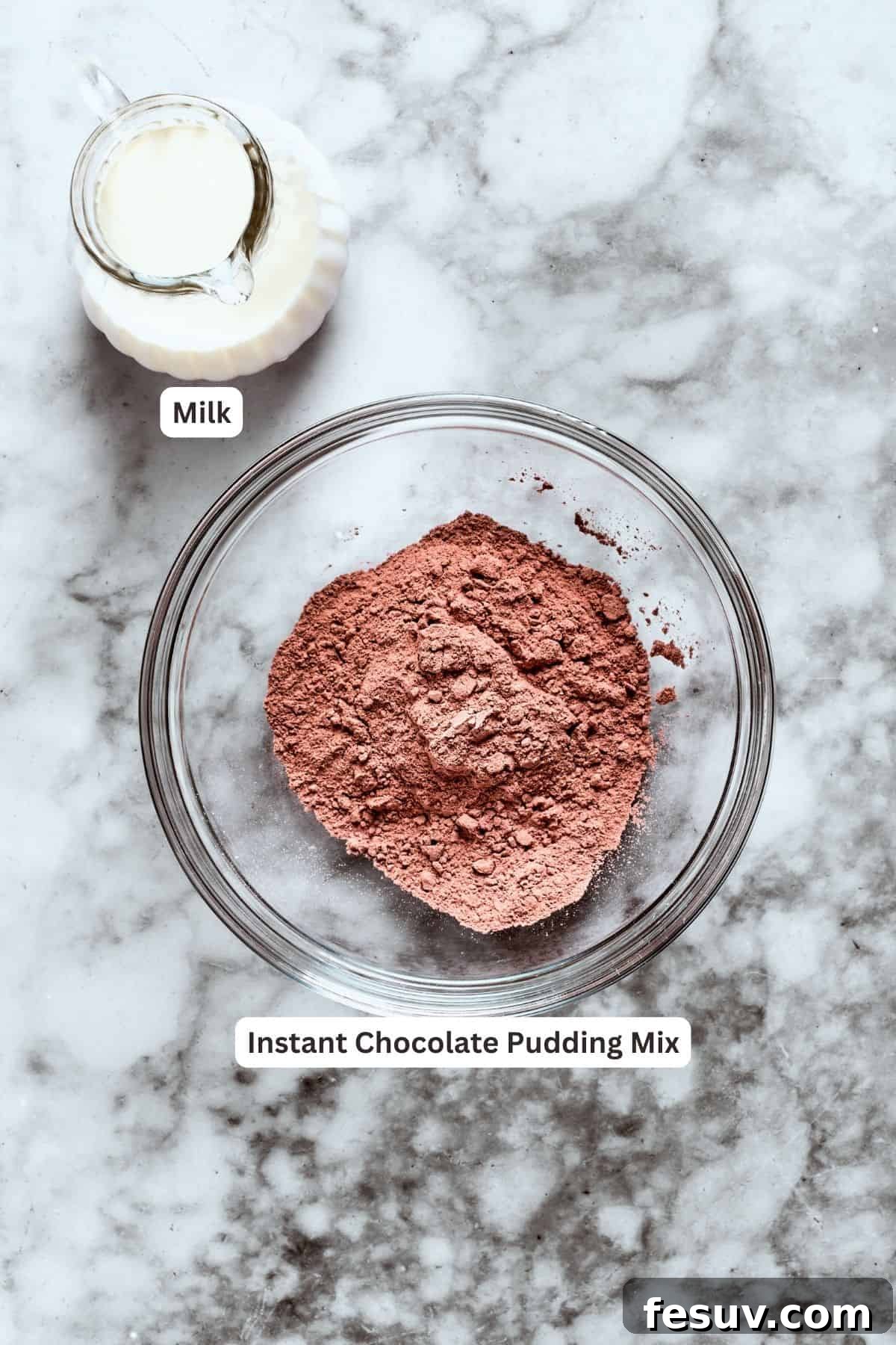 Heaven in a Pan 3 Chocolate pudding layer ingredients are shown: instant chocolate pudding and milk.