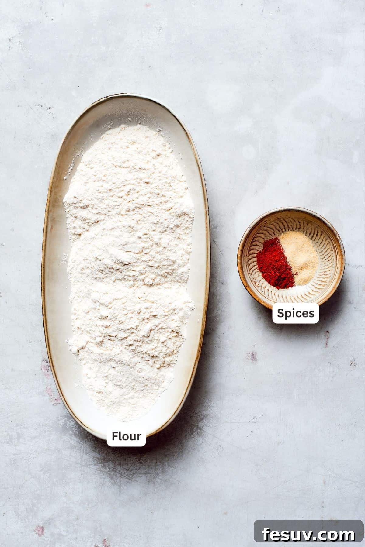 Ingredients for the dredging mixture, labeled as flour and various spices.