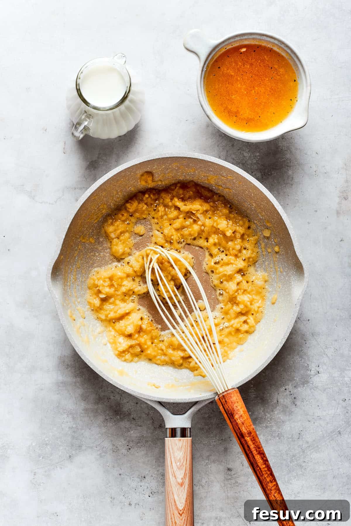 From-scratch Broccoli & Rice Casserole folds tender broccoli and fluffy white rice into a gorgeously creamy three-cheese sauce. Cheddar cheese is whisked into a roux.