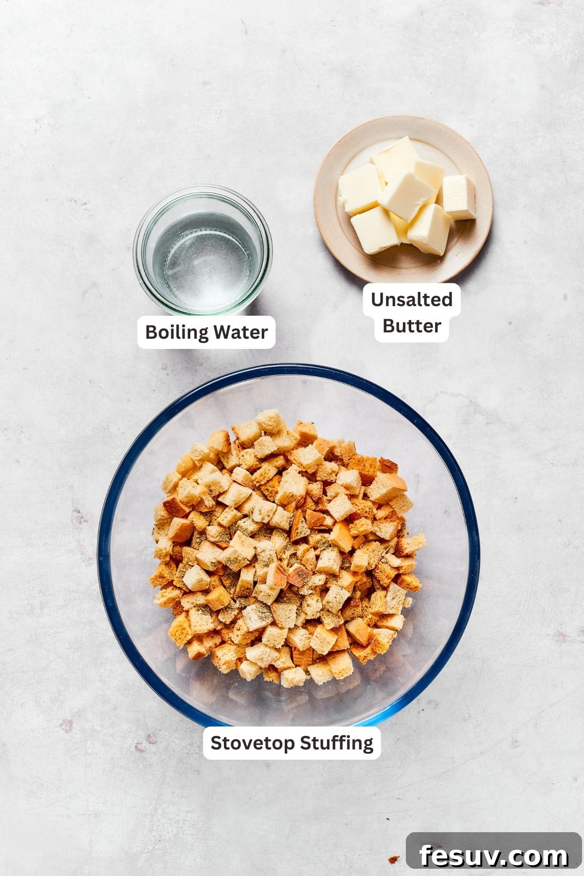 Ingredients for stuffing including stovetop stuffing, boiling water, and melted butter.