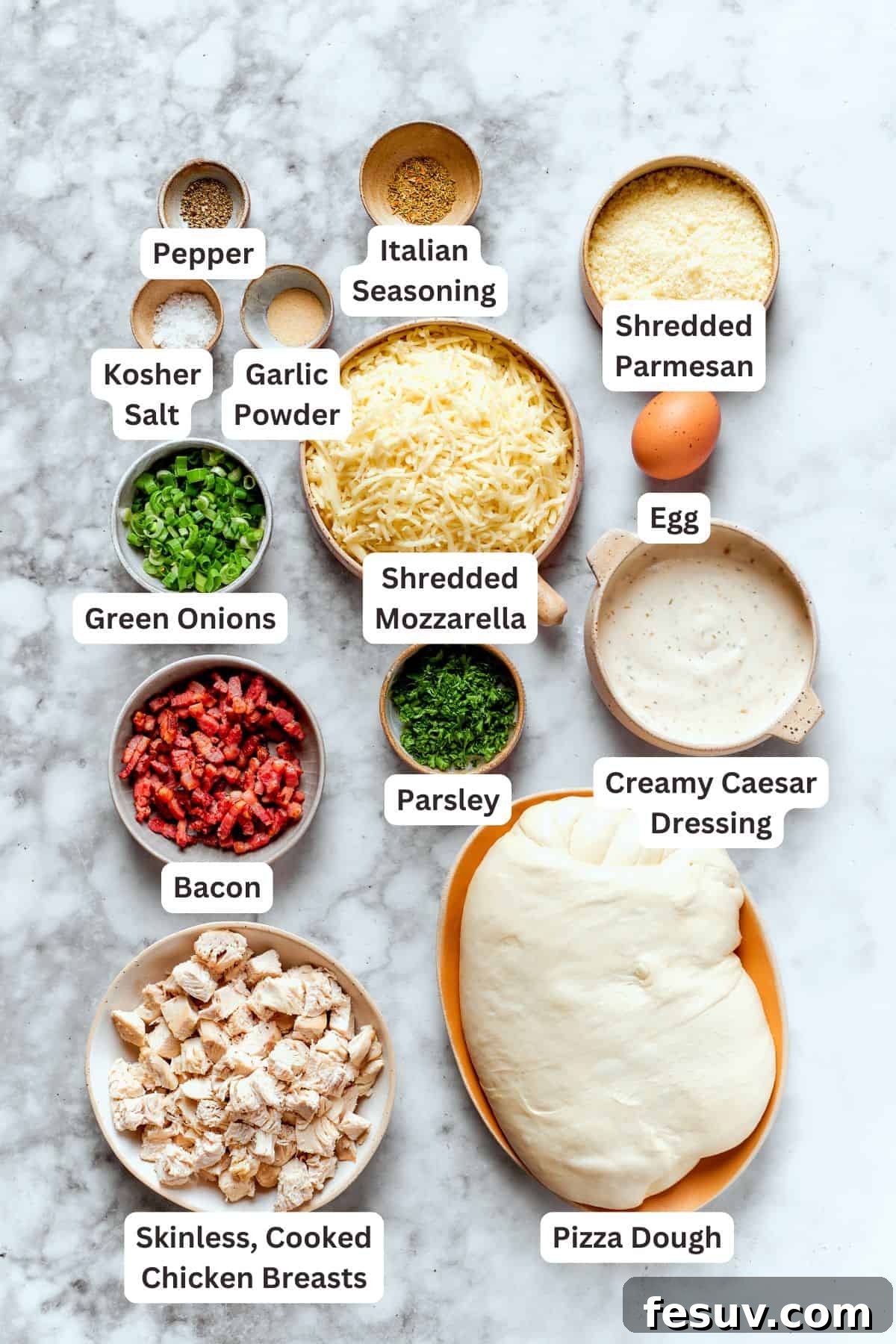 Individual ingredients for Costco chicken bake laid out: chicken, bacon, cheeses, green onions, and seasonings.