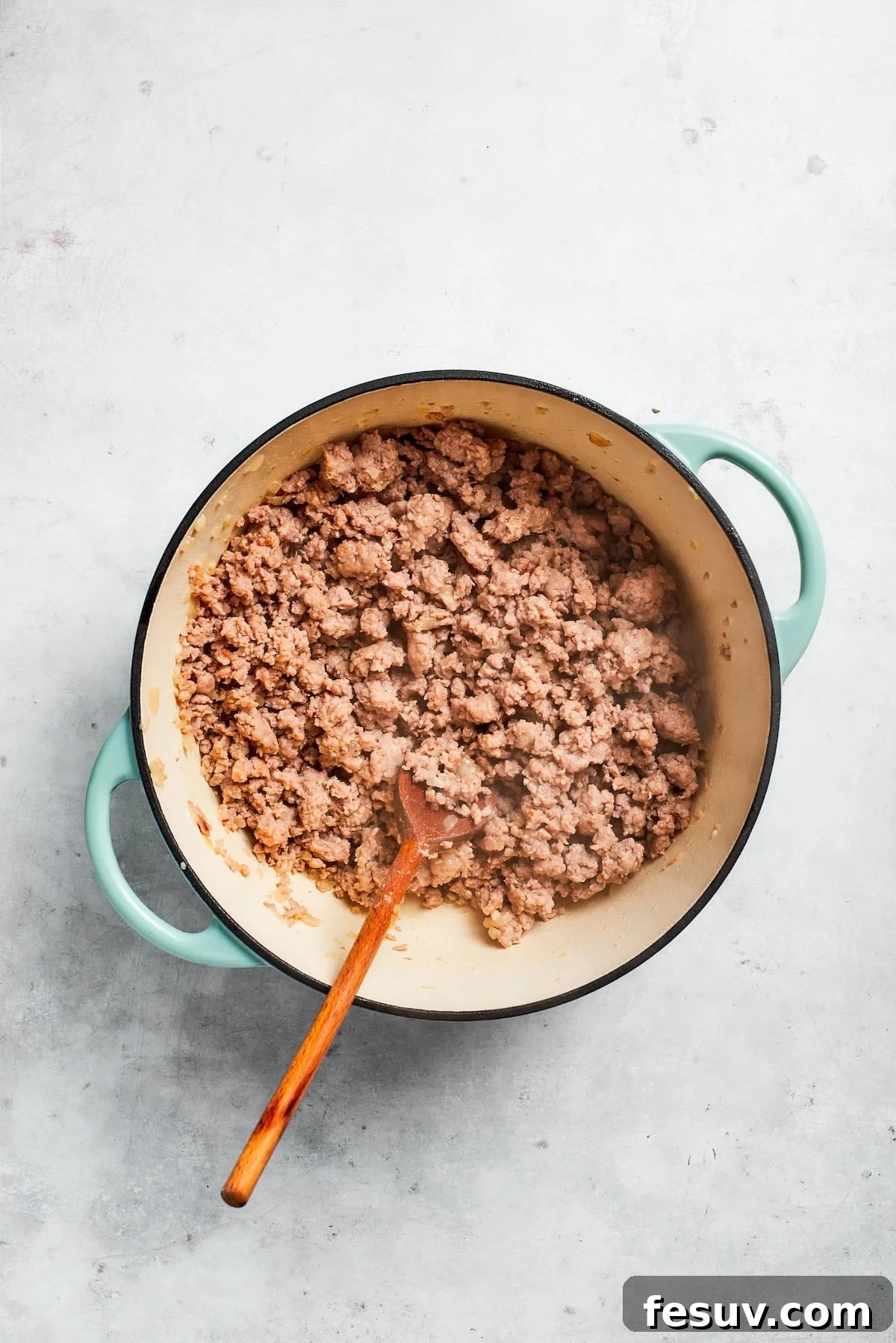 Beef cooks down in a skillet, browning evenly to lock in flavor.
