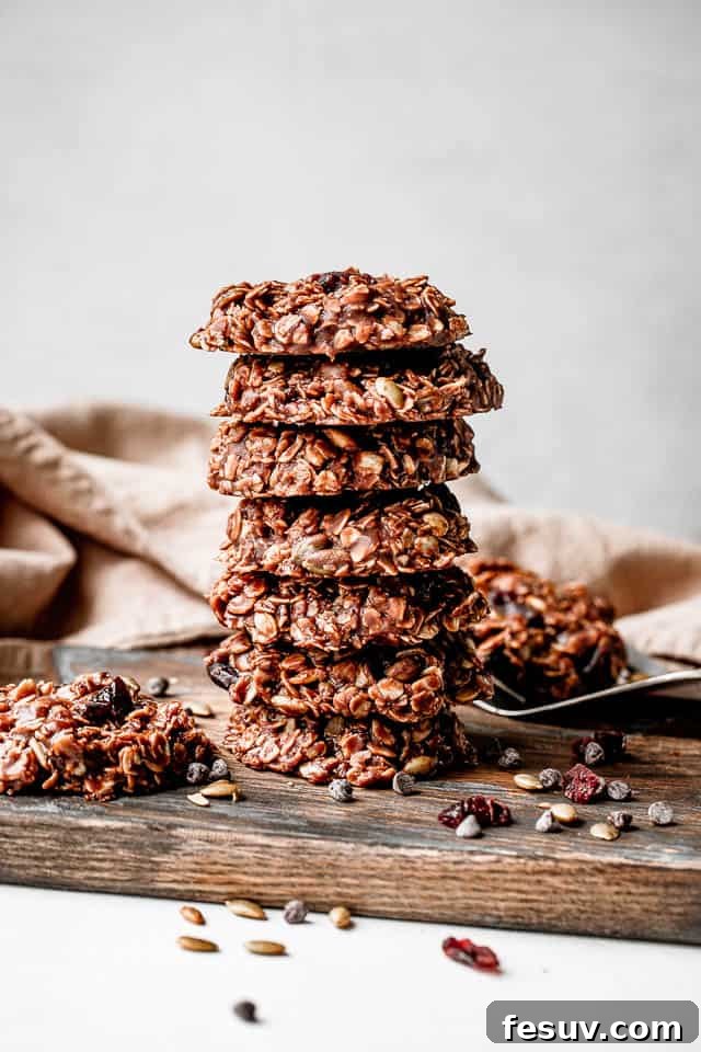 A beautifully arranged stack of seven healthy no-bake oatmeal cookies, ready to be enjoyed as a wholesome and easy snack.