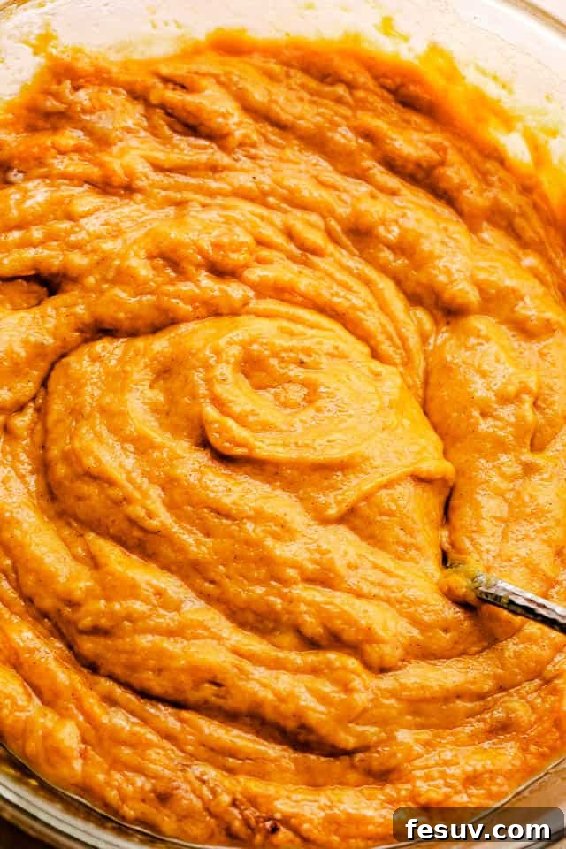 Bowl of fresh pumpkin puree ready for baking.