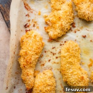 overhead shot of chicken tenders on a baking sheet