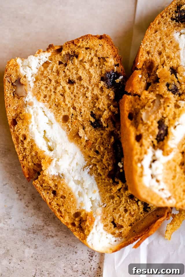 Cinnamon Swirl Pumpkin Bread 5 overhead shot of a slice of pumpkin bread stuffed with cream cheese
