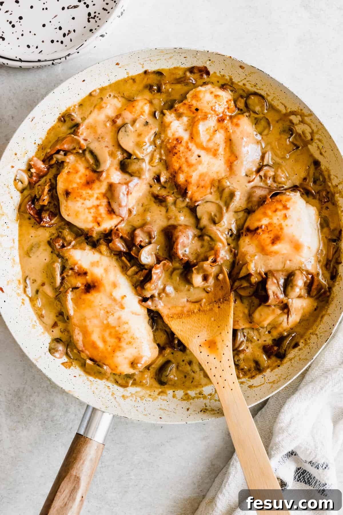 Rich Creamy Chicken Marsala 3 Four pieces of chicken in a mushroom marsala sauce.