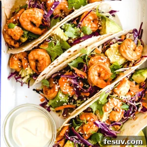 Zesty Lime Shrimp Tacos 2 Four Shrimp Tacos Topped with Asian Slaw on a Serving Platter