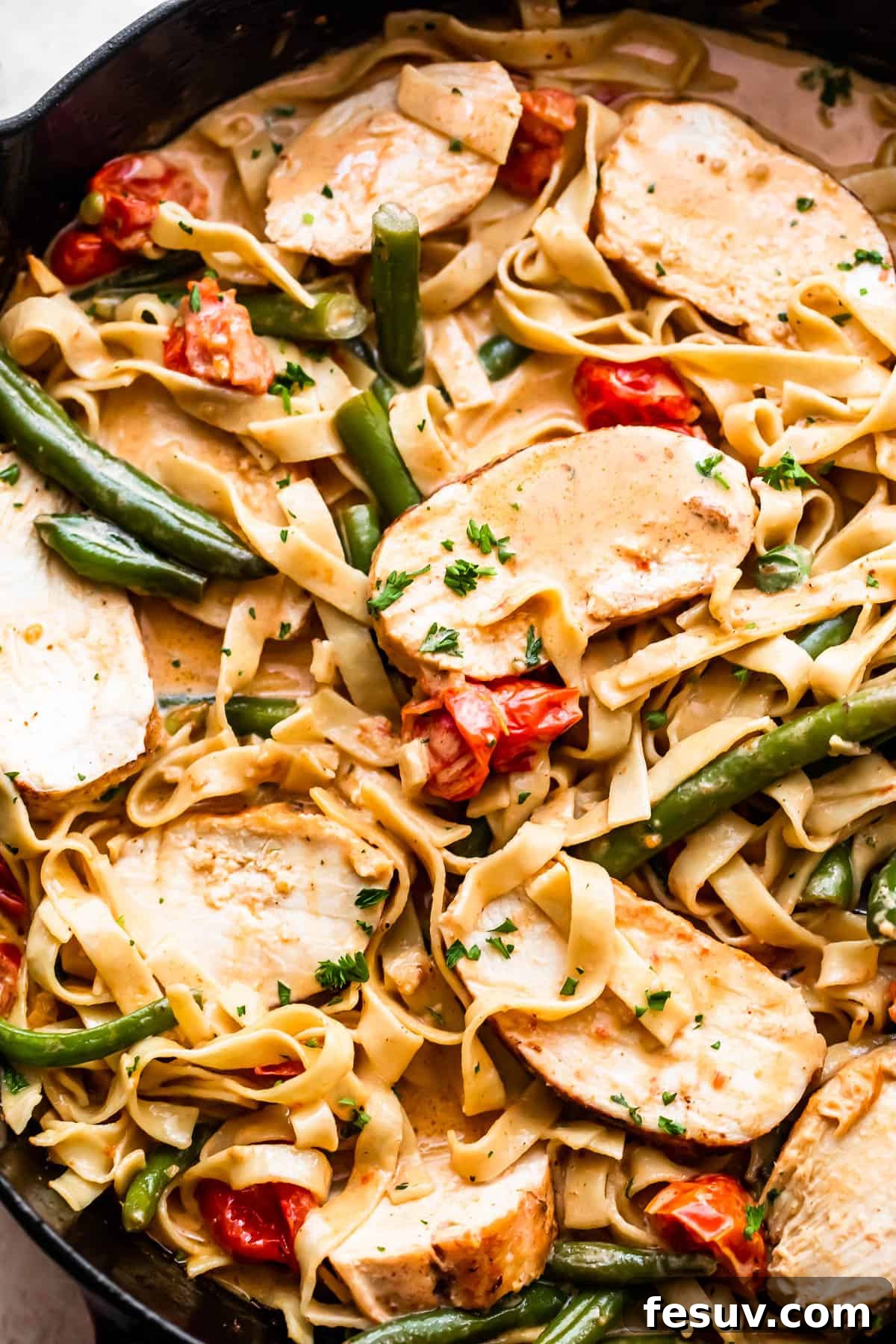 Bayou Blackened Chicken Pasta 3 fettuccine pasta in creamy sauce with slices of blackened chicken, tomatoes, and green beans
