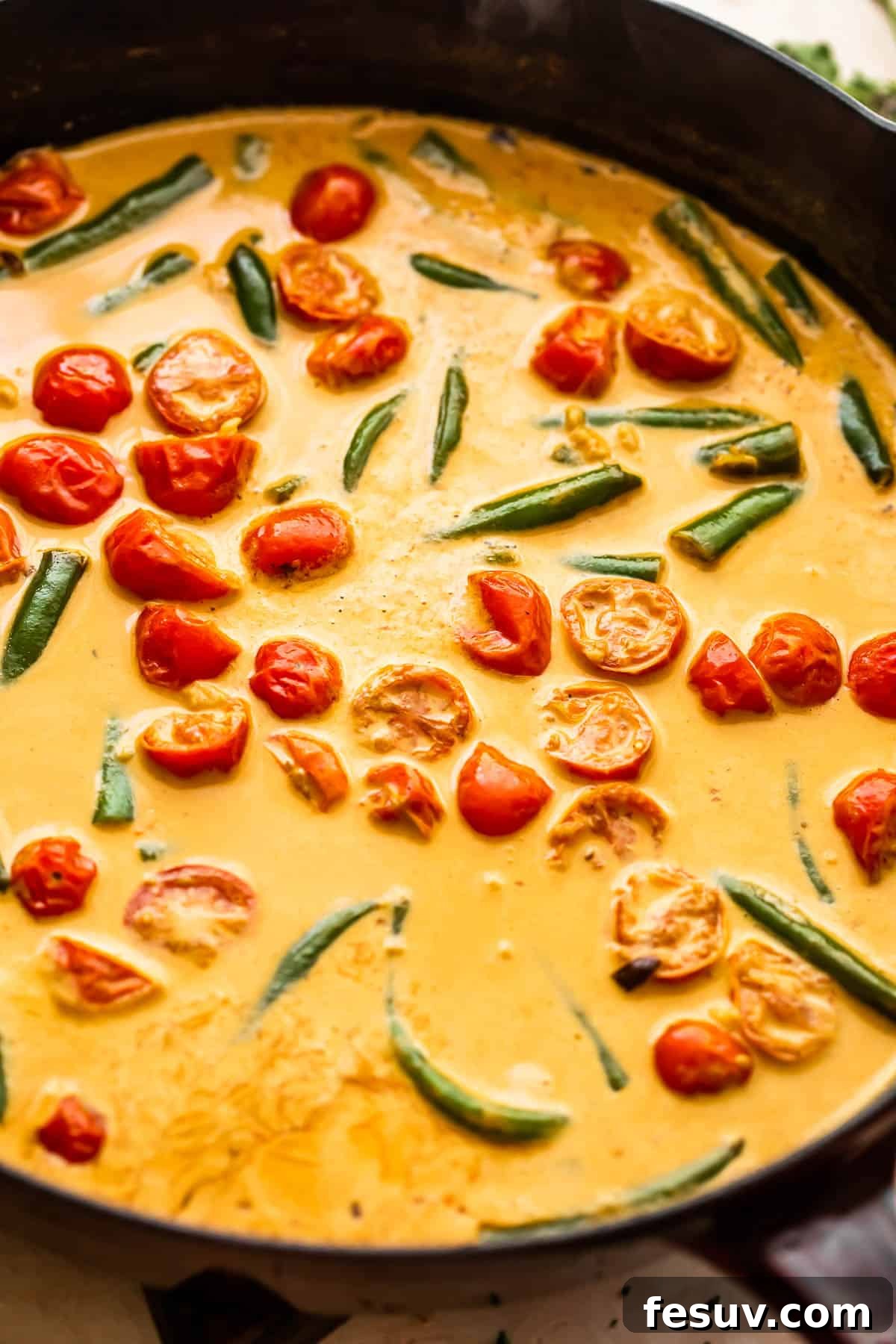 Bayou Blackened Chicken Pasta 7 skillet with tomatoes and green beans mixed creamy sauce