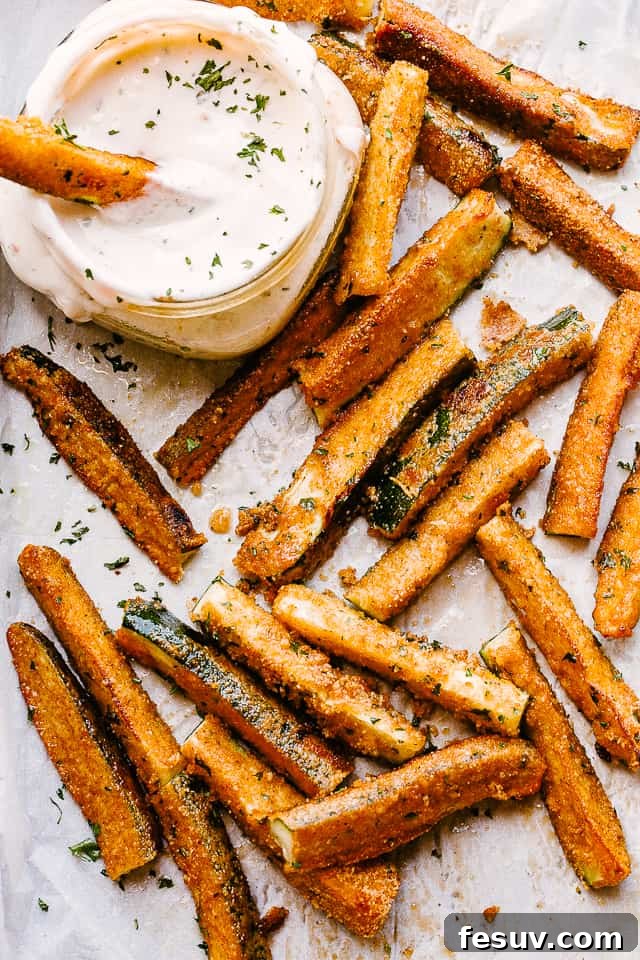 These air fryer zucchini fries are super crispy on the outside, tender on the inside, and perfect for dipping. Your go-to summer side dish! Air fryer zucchini fries.