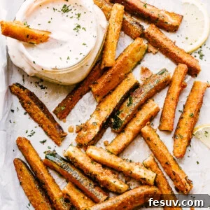 Parmesan Crusted Air Fryer Zucchini Sticks 2 Crispy zucchini fries with dipping sauce