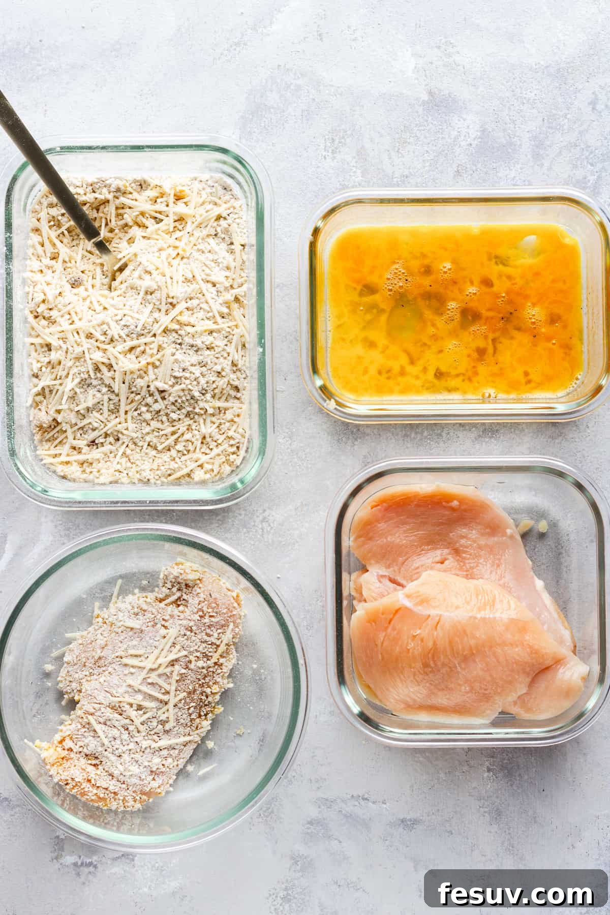 Crispy Air Fryer Chicken Parmesan 6 Three Pieces of Raw Chicken Beside a Piece of Raw, Coated Chicken and the Breading and Egg Mixtures