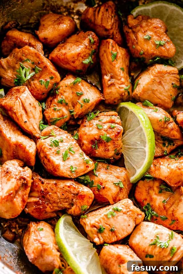 Flavorful taco chicken bites, perfect for meal prep or quick dinners. A close-up shot of juicy, perfectly seasoned taco chicken bites in a skillet.