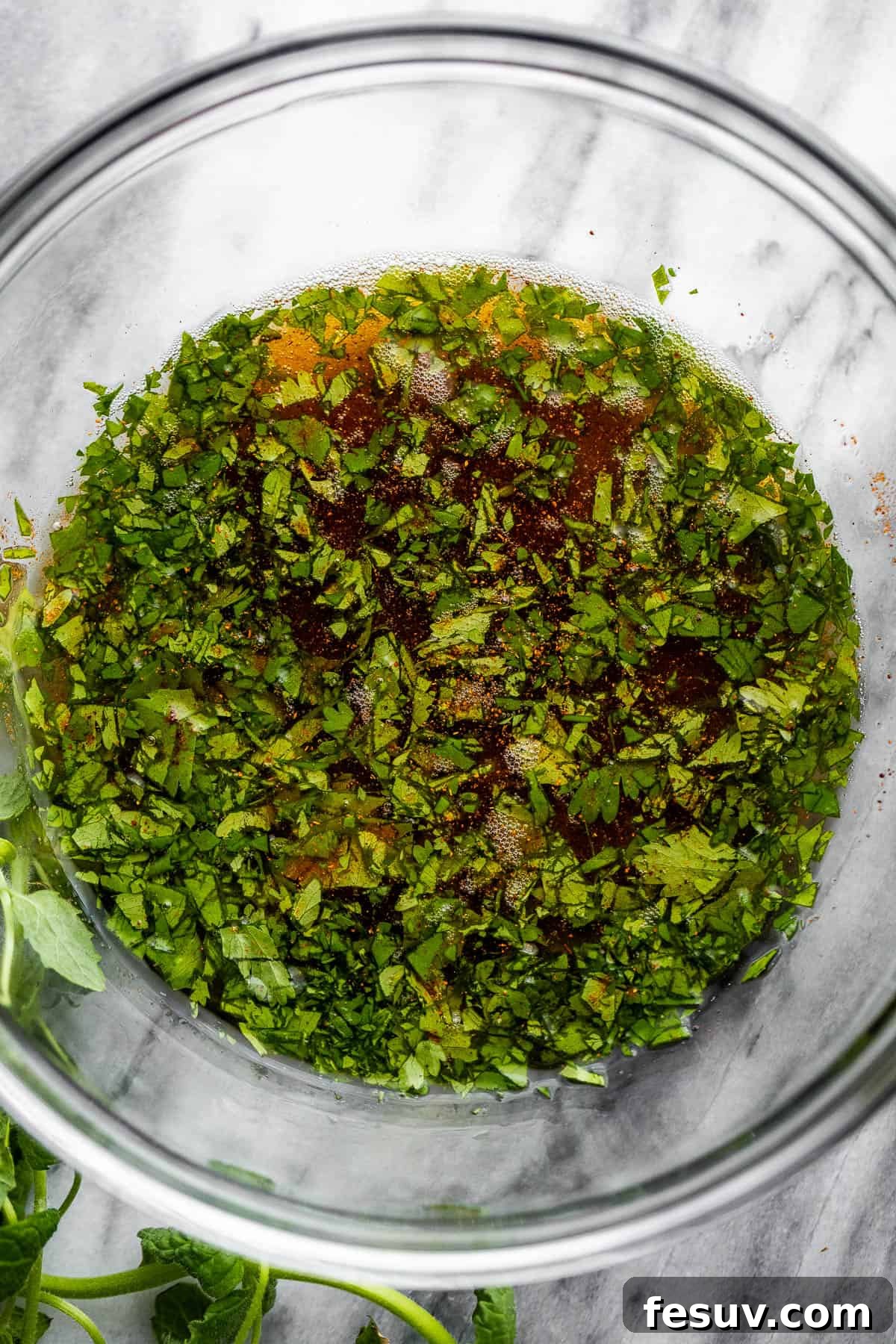 Tequila-Kissed Grilled Pineapple 5 tequila, cilantro, and brown sugar in a mixing bowl