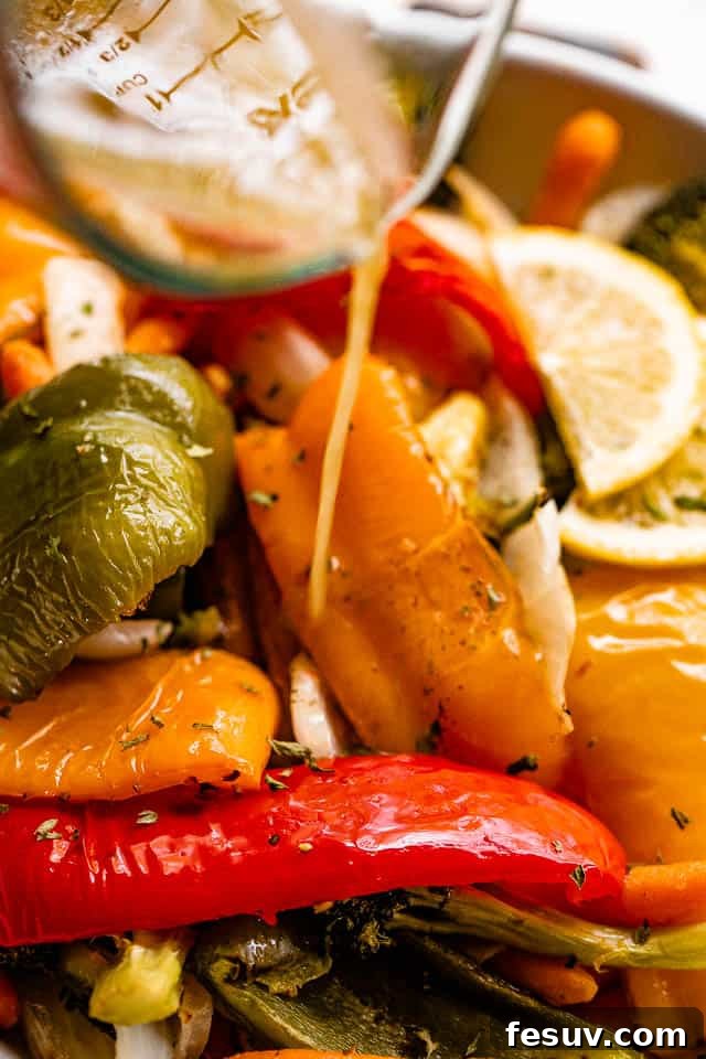 Zesty Grilled Vegetable Medley 6 pouring lemon vinaigrette over grilled bell peppers
