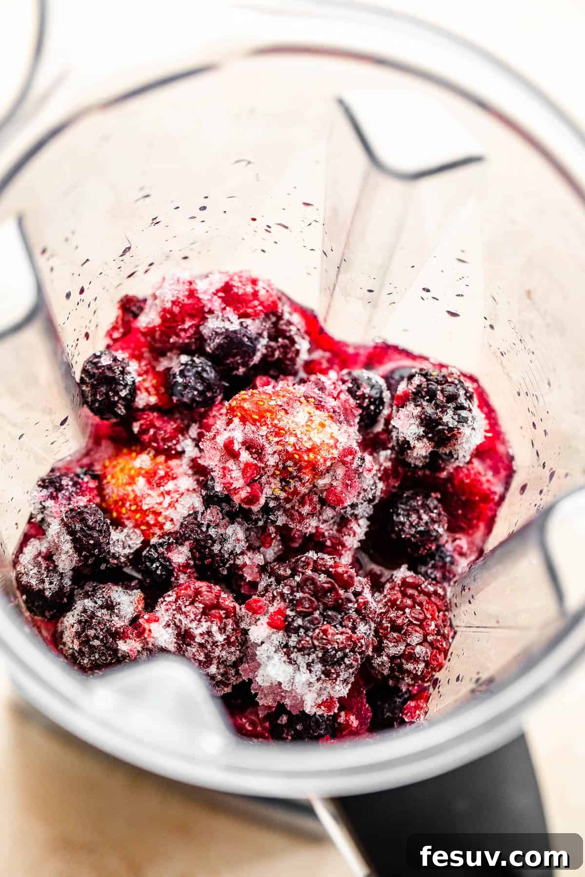 Blended Berry Margaritas 4 frozen berries in a blender
