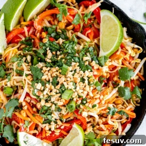 Homemade Pad Thai in a black skillet.