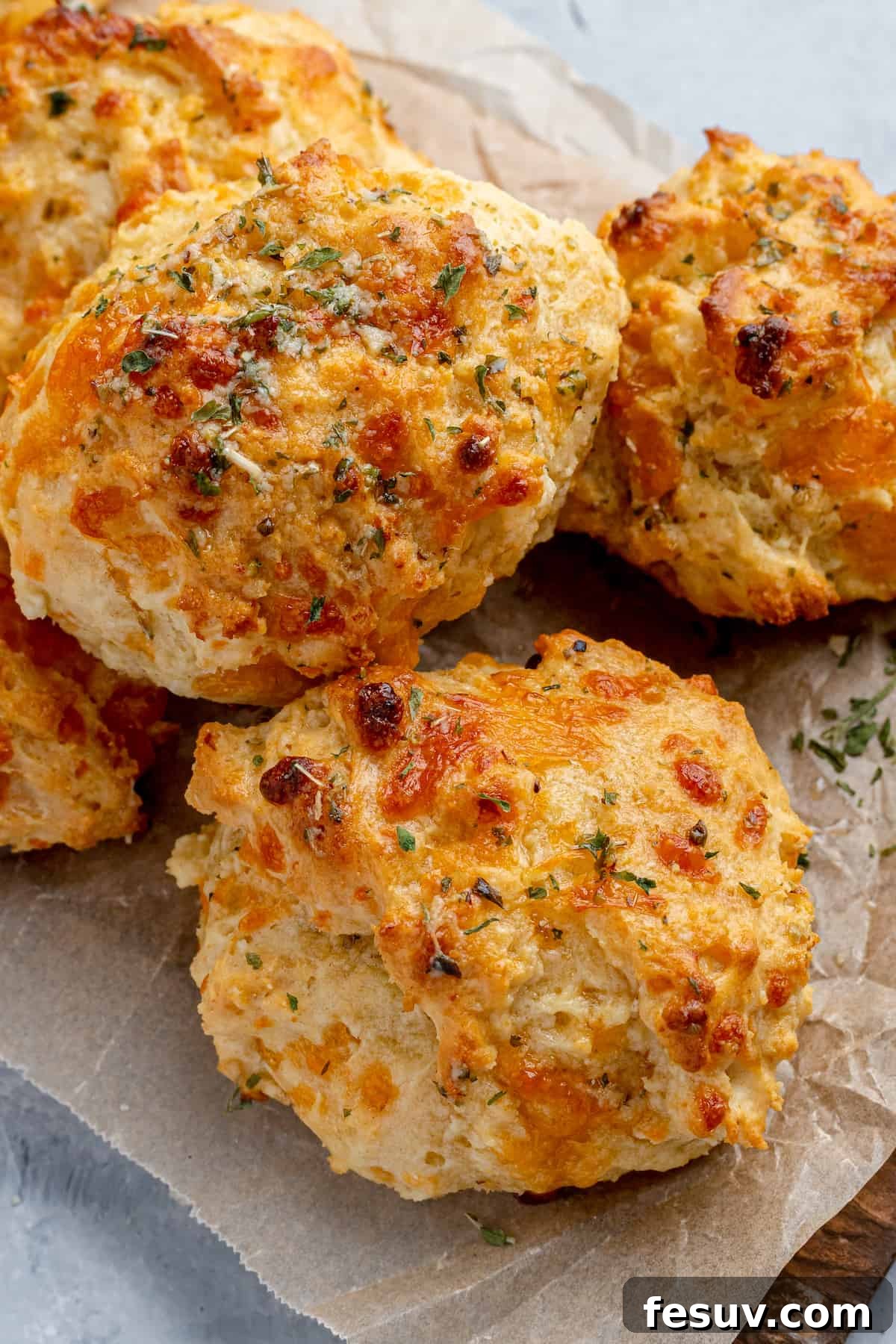 Buttery, garlicky and laced with melted cheddar, these easy Air Fryer Red Lobster Biscuits bake up light and fluffy in no time!