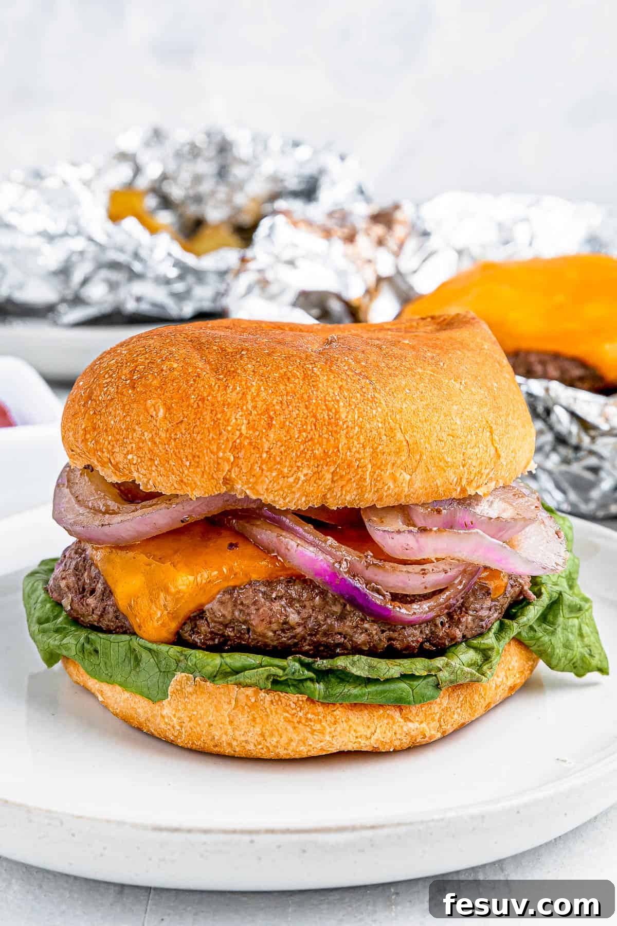 Hearty Cheeseburger Foil Packs with Potatoes and Vegetables 6 Cheeseburger in a bun