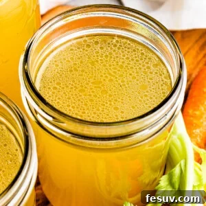 A finished jar of Instant Pot Chicken Broth