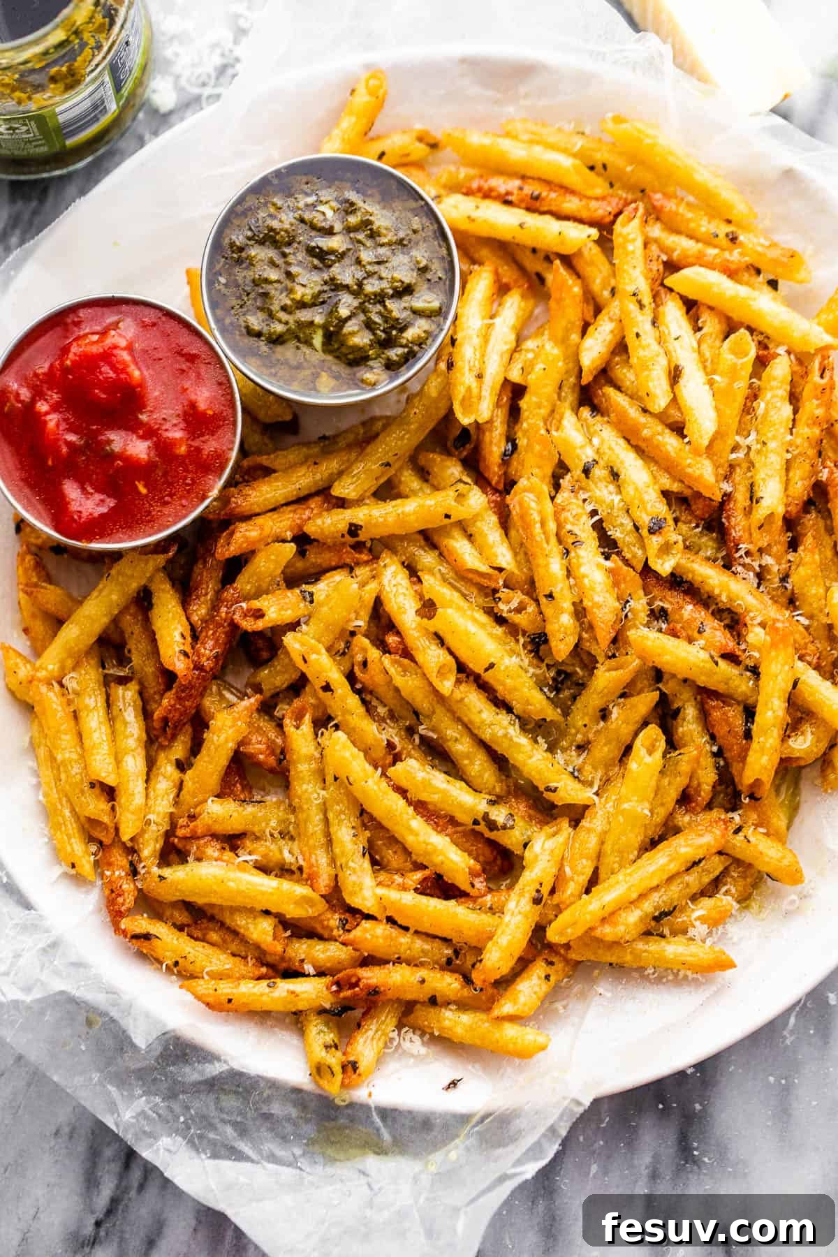 Crispy Pasta Chips Air Fried or Oven Baked 3 plate with baked pasta chips served with a side of basil pesto and marinara sauce