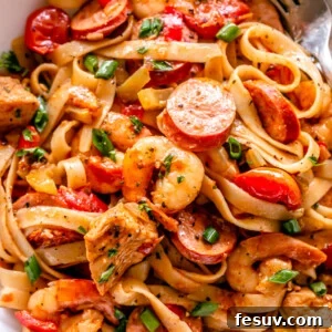 One Pot Jambalaya served in a white dish with pasta
