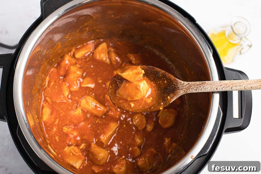 The orange chicken with its sauce beautifully thickened to a glossy, irresistible glaze.