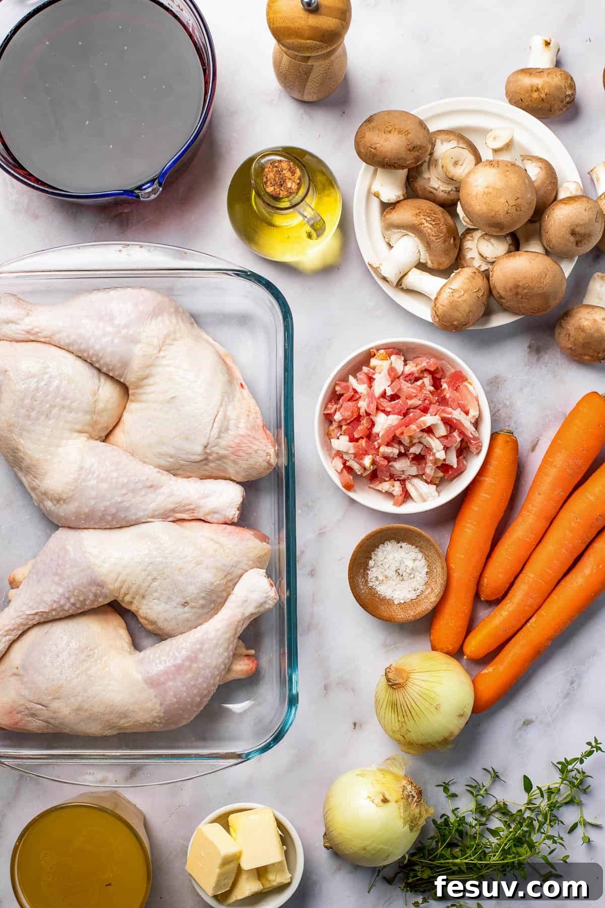 Instant Pot Coq au Vin: Classic French Flavor, Modern Speed 3 Clockwise from top: Black pepper, mushrooms, carrots, bacon, salt, onions, fresh thyme, butter, chicken leg quarters, red wine.